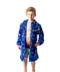 Boy wearing size 10 Schmik fishbone swim parka, Swim parka has remobable sleeves and a fishbone pattern. Swim parka comes with pockets and has a fitted hood. 